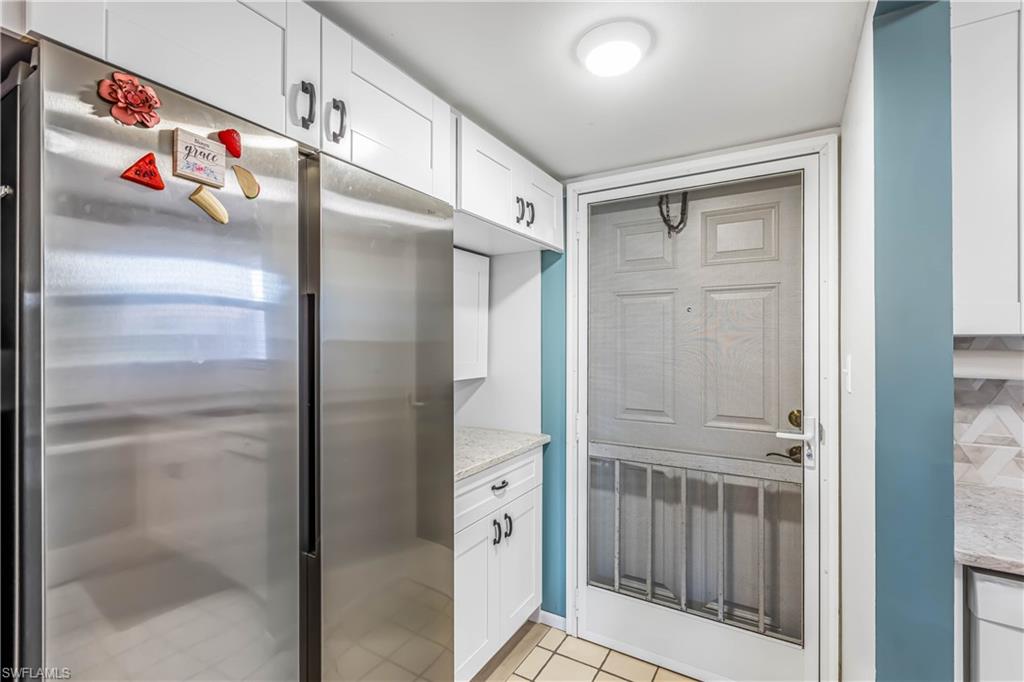 400 Forest Lakes Boulevard, Unit 210 Naples, FL 34105 - Photo 8 of 20 Built in refrigerator