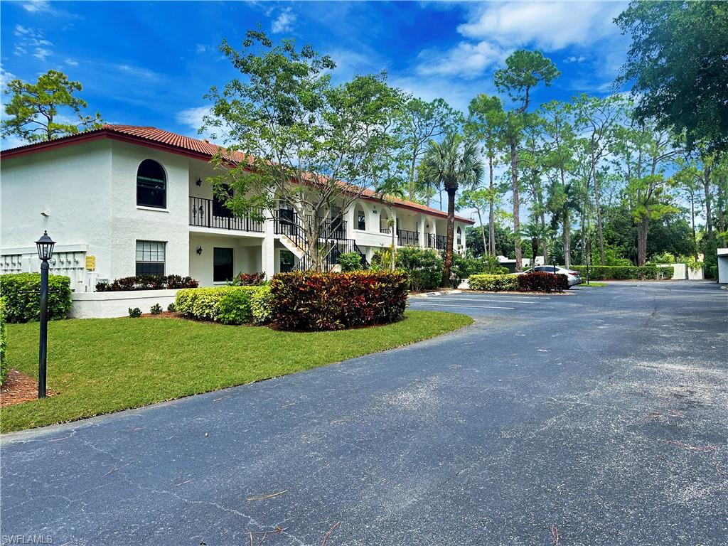 905 Augusta Boulevard, Unit 9056 Naples, FL 34113 - Photo 2 of 28 View of street