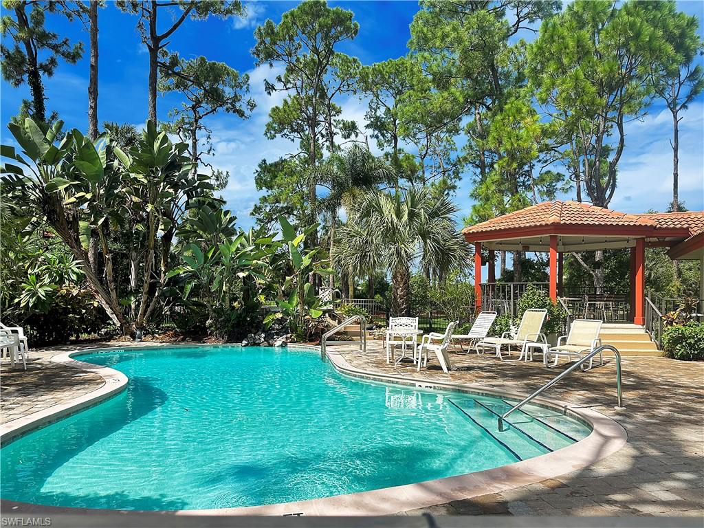 905 Augusta Boulevard, Unit 9056 Naples, FL 34113 - Photo 27 of 28 View of swimming pool with a patio area and a gazebo