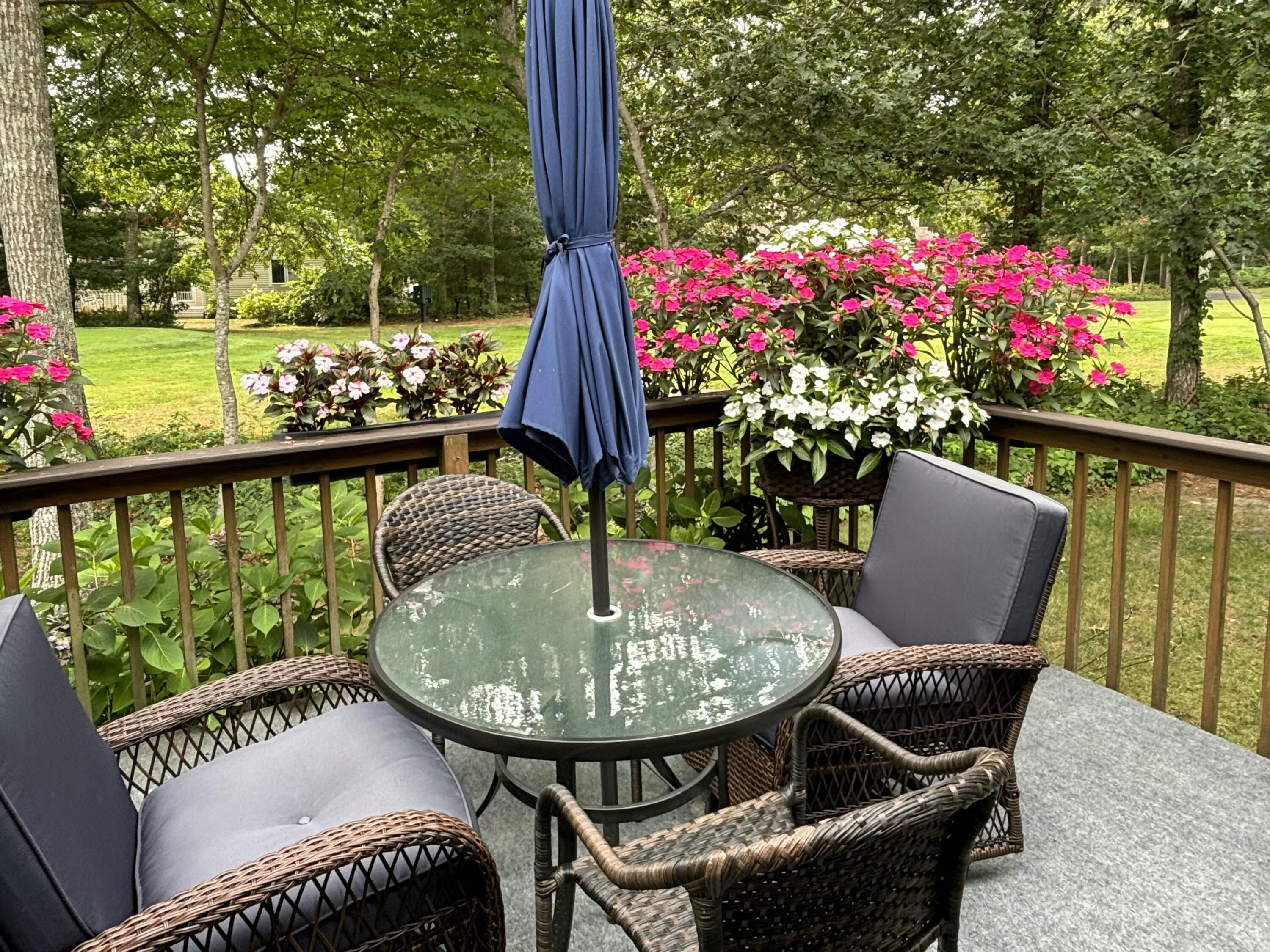 14 Pga Lane Mashpee, MA 02649 - Photo 3 of 14 a view of a chairs and table in the patio