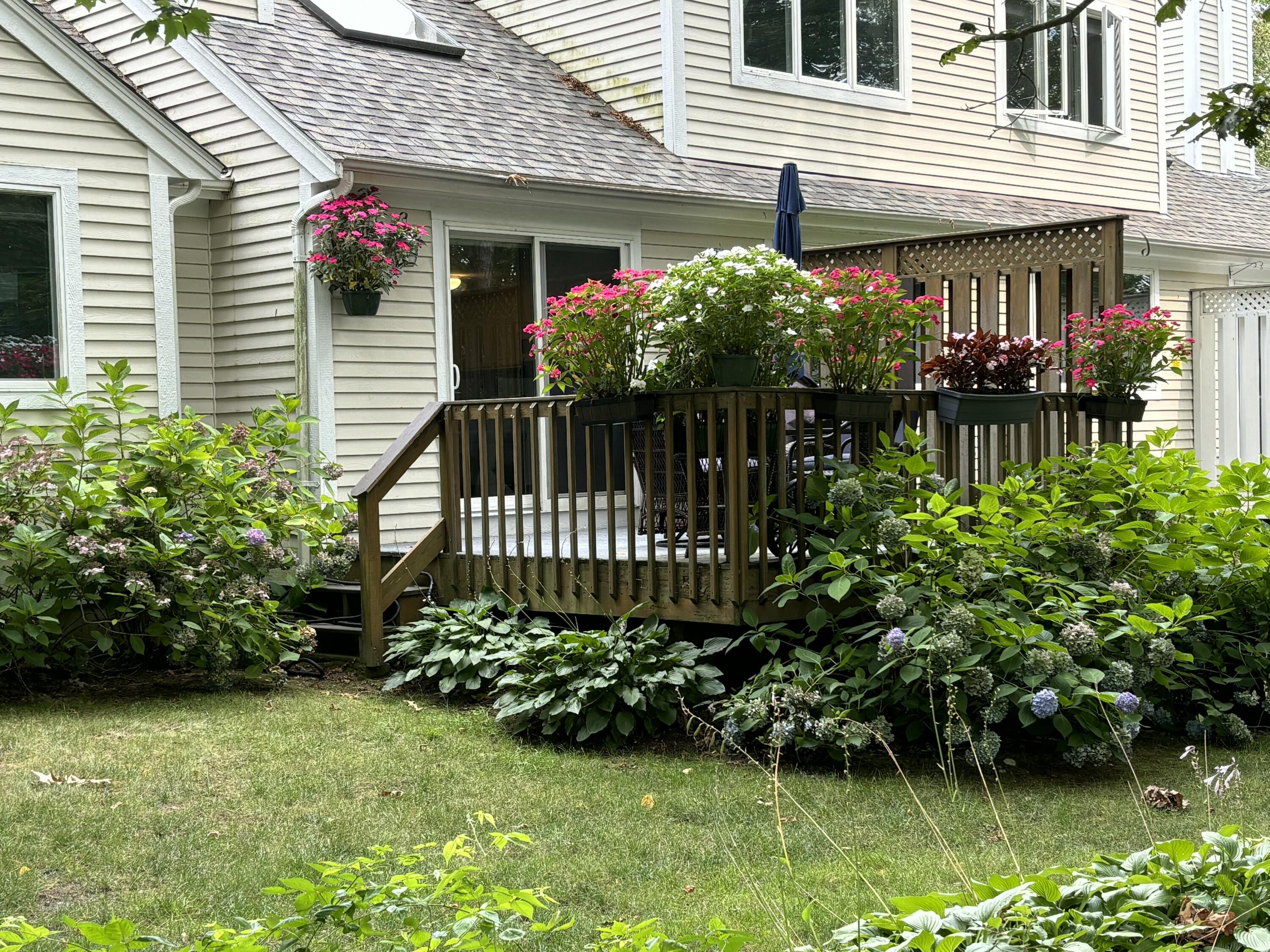 14 Pga Lane Mashpee, MA 02649 - Photo 4 of 14 a front view of a house having yard