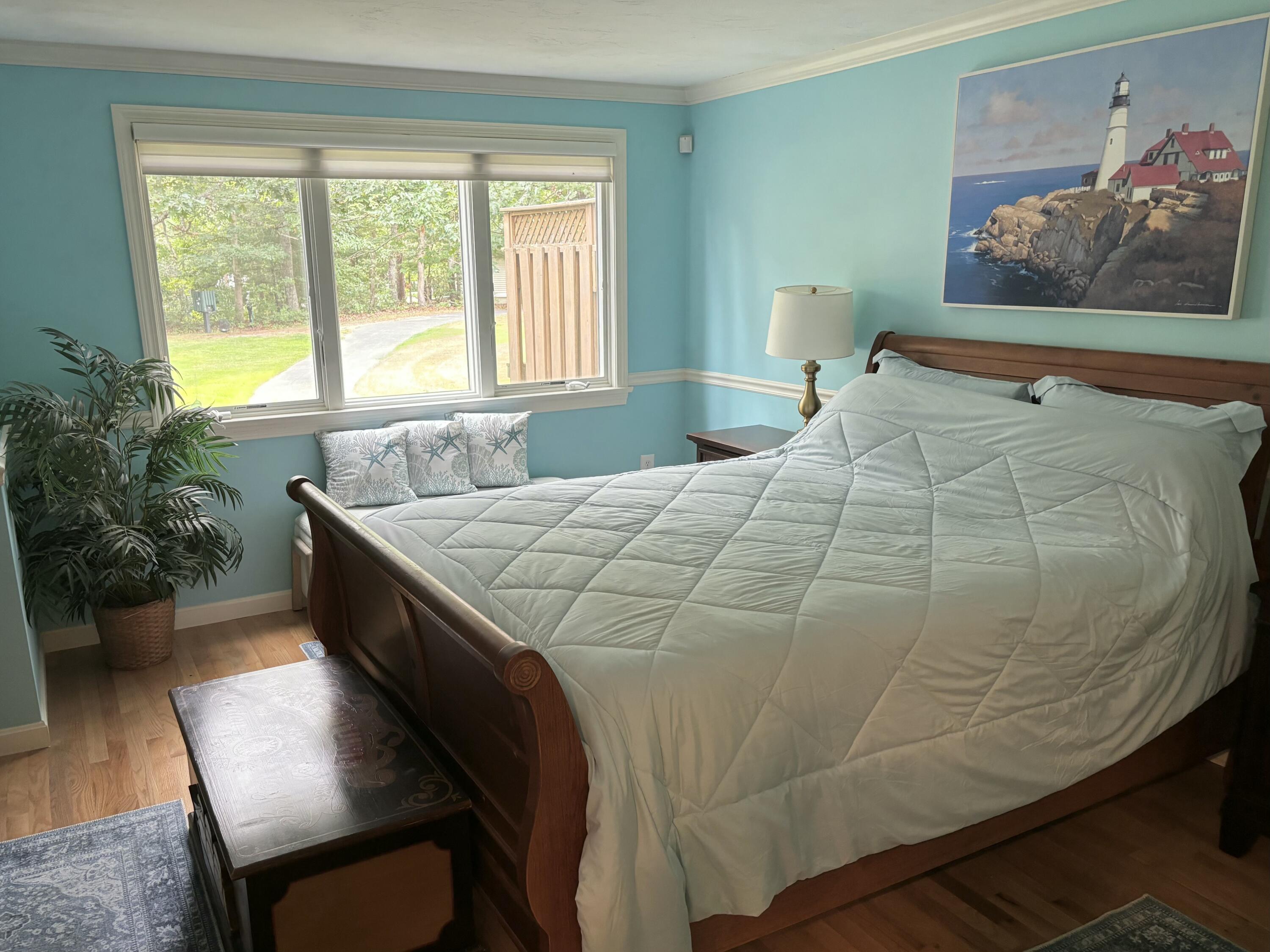 14 Pga Lane Mashpee, MA 02649 - Photo 9 of 14 a bedroom with a bed and a window