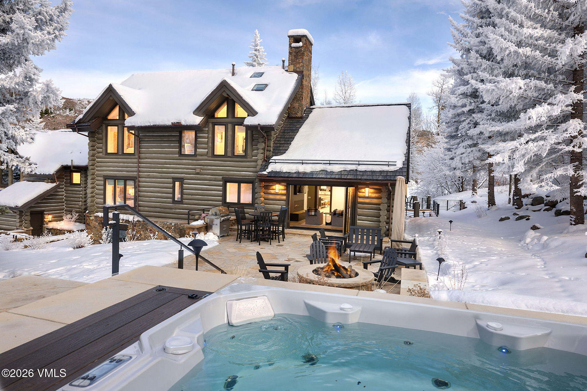 137 Borders Road Avon, CO 81620 - Photo 10 of 31 2602_137_borders_rd_exterior_hottub_a