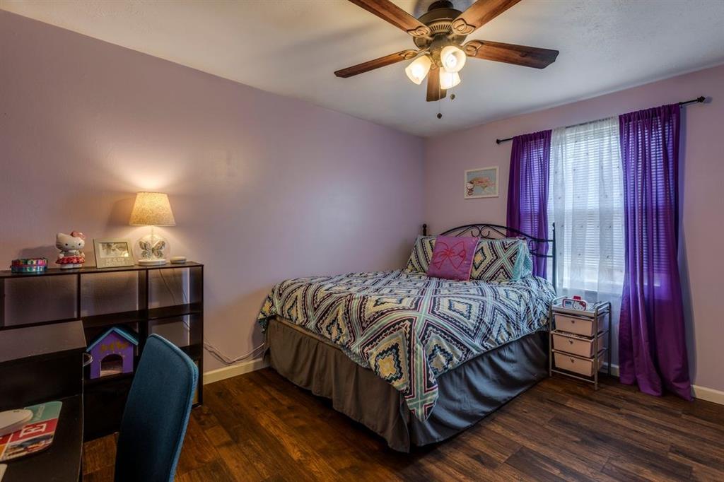 133 Glengarry Drive Coraopolis, PA 15108 - Photo 18 of 24 a bedroom with a bed and a chandelier fan