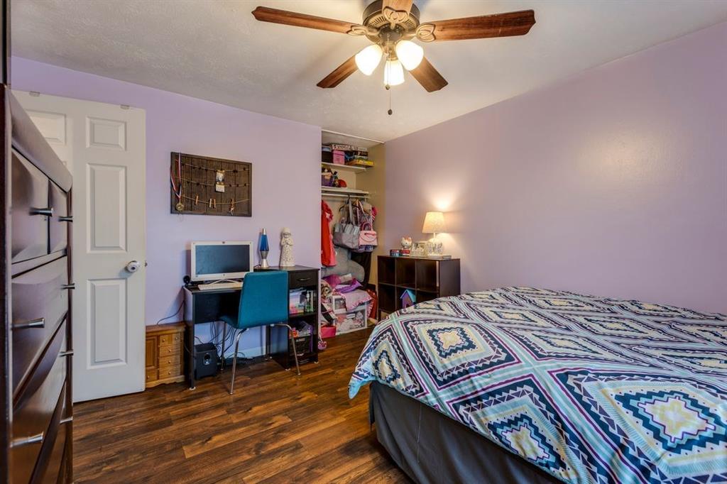 133 Glengarry Drive Coraopolis, PA 15108 - Photo 19 of 24 a bedroom with a bed and a chandelier