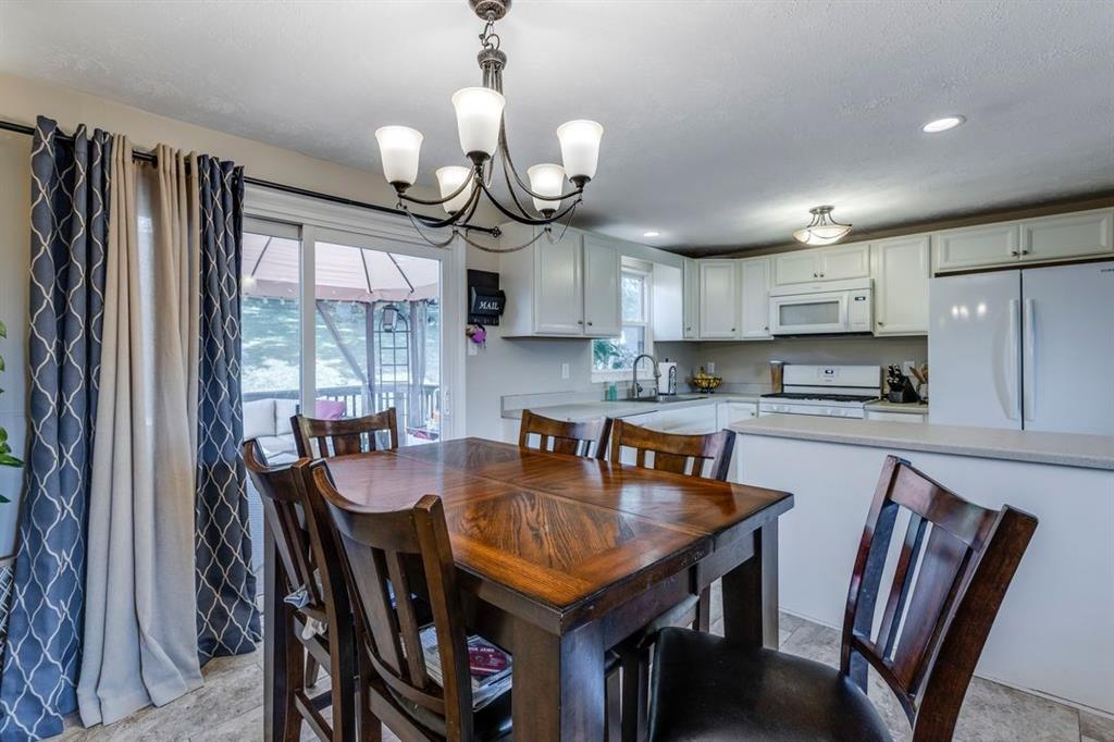 133 Glengarry Drive Coraopolis, PA 15108 - Photo 7 of 24 a view of a dining room with furniture window and wooden floor