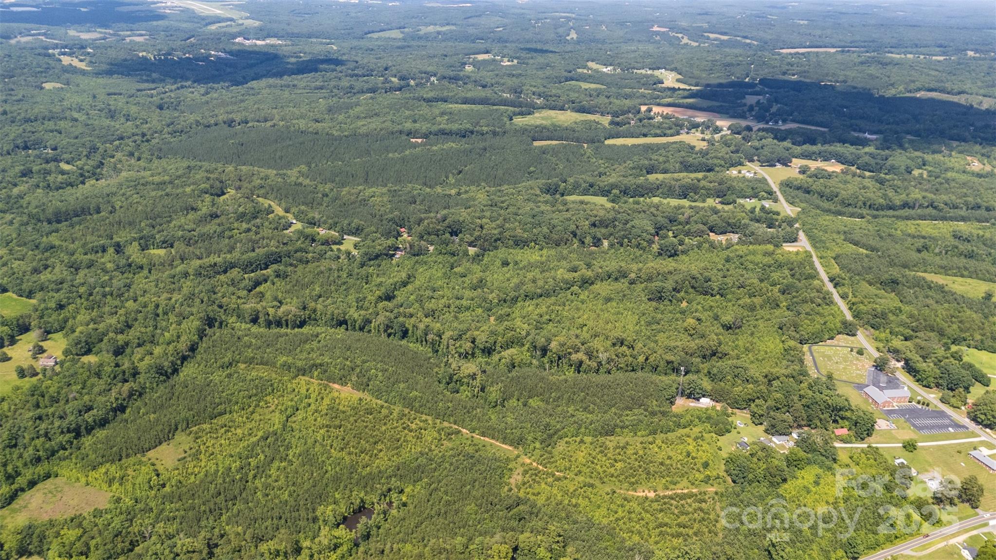 5600 Walters Mill Road Providence, NC 27315 - Photo 12 of 12 a view of a yard