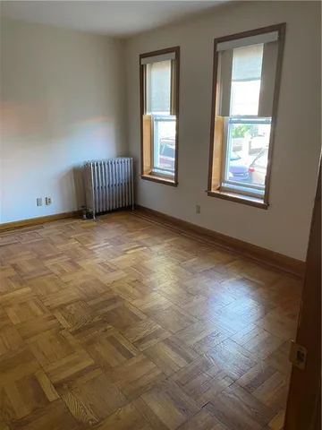 a view of an empty room and window