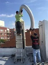 a picture of a bench in front of building