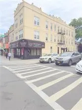 a view of a building and a street