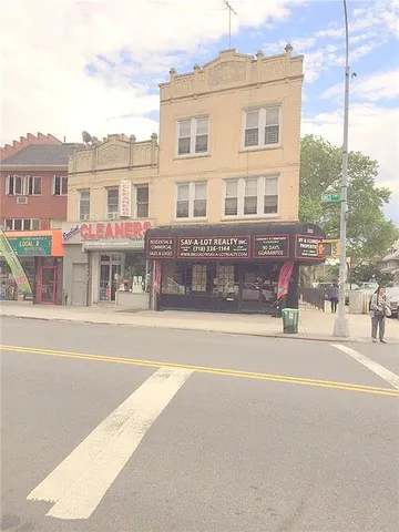 a view of a building with a street