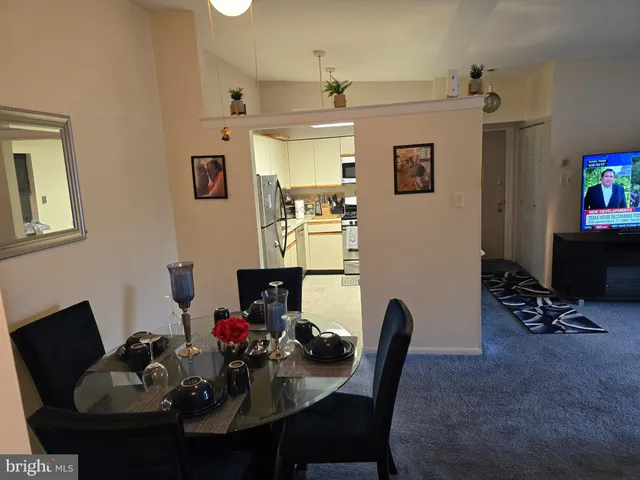 a view of a dining room with furniture