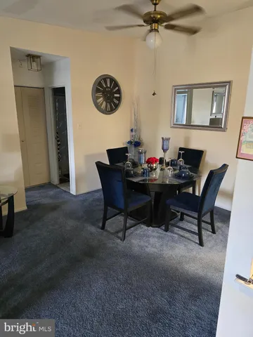 a view of a livingroom with furniture and a table