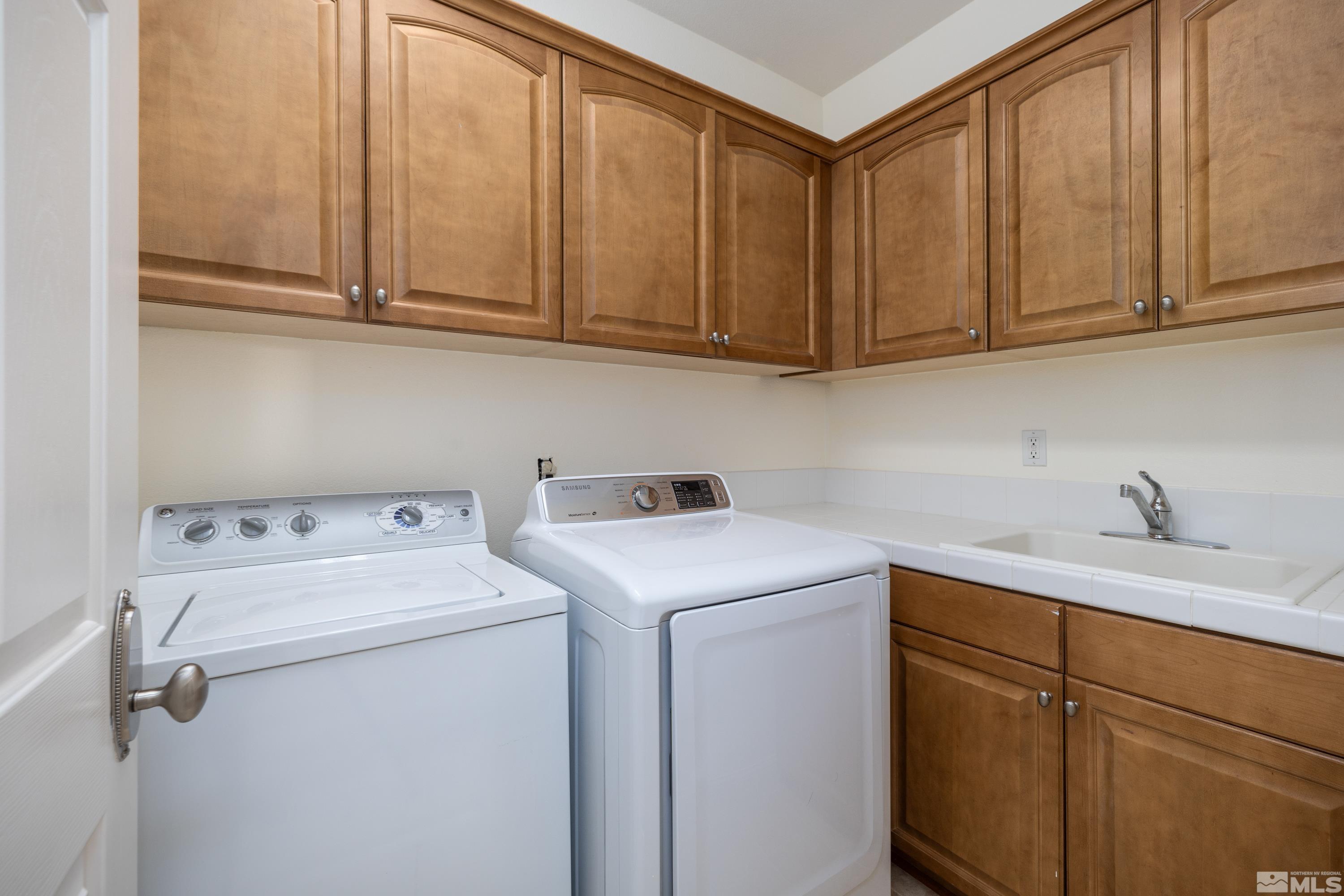 2585 Baton Drive Reno, NV 89521 - Photo 16 of 28 a utility room with dryer and washer