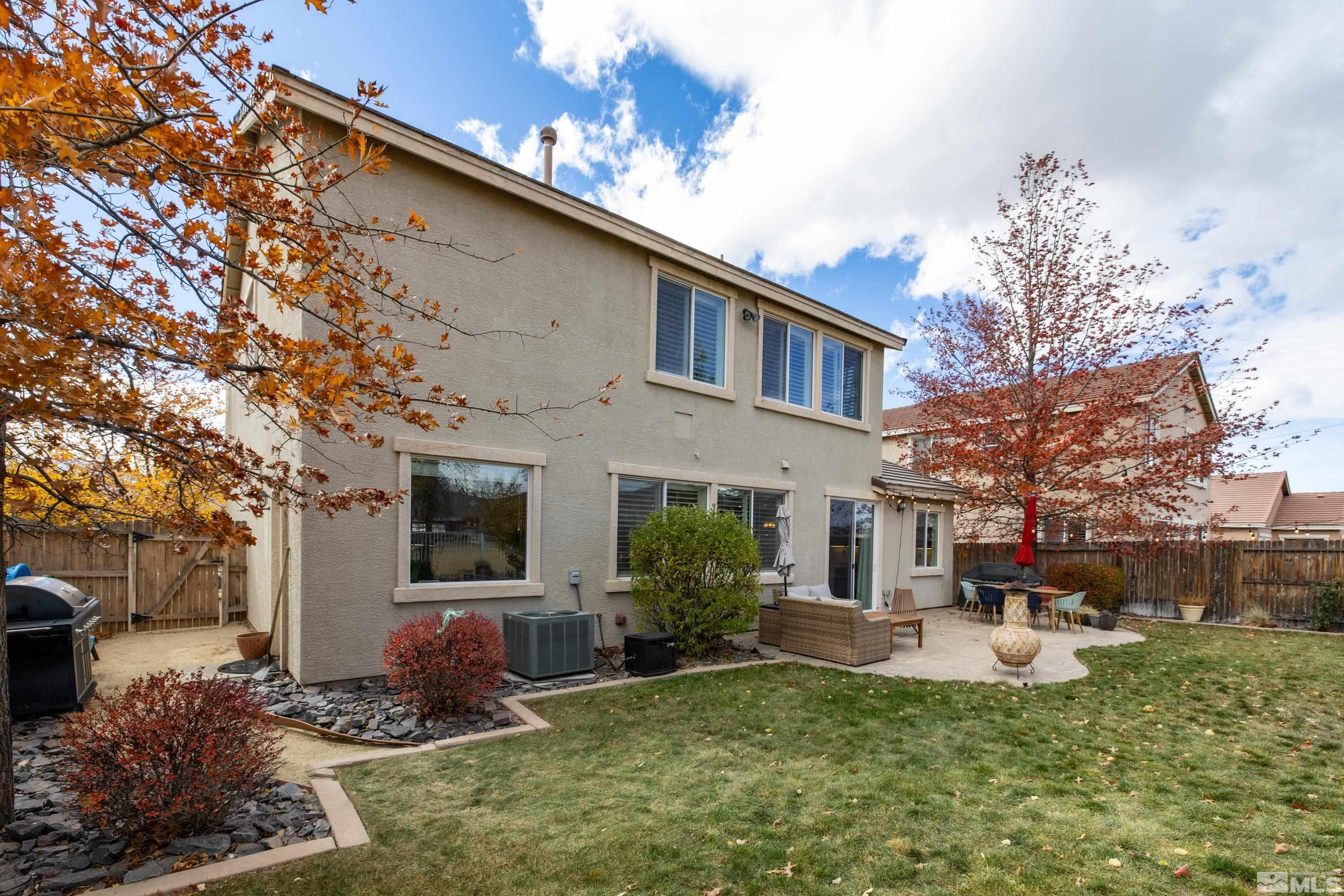2585 Baton Drive Reno, NV 89521 - Photo 22 of 28 a view of a house with backyard and sitting area