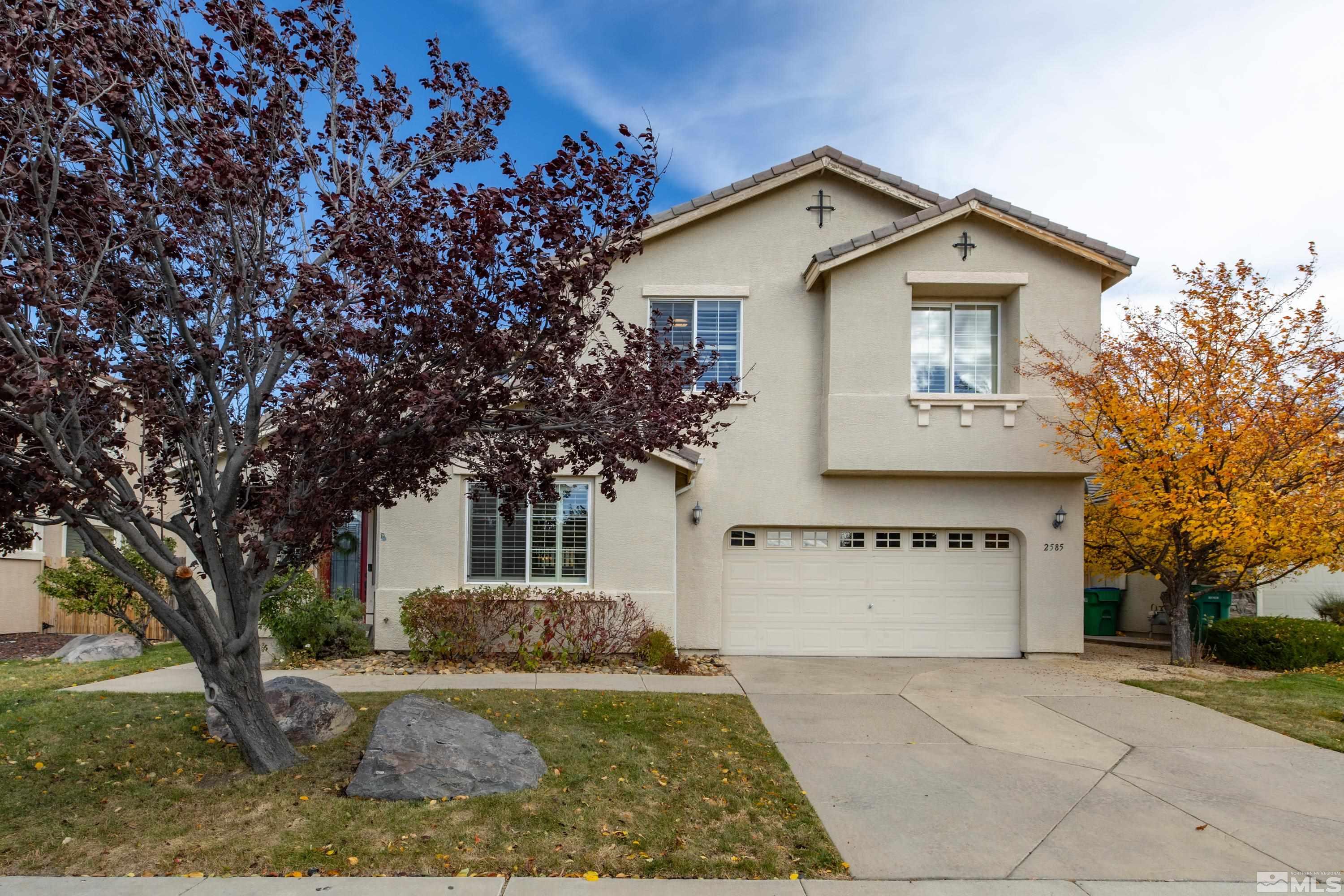 2585 Baton Drive Reno, NV 89521 - Photo 24 of 28 a view of a house with a yard