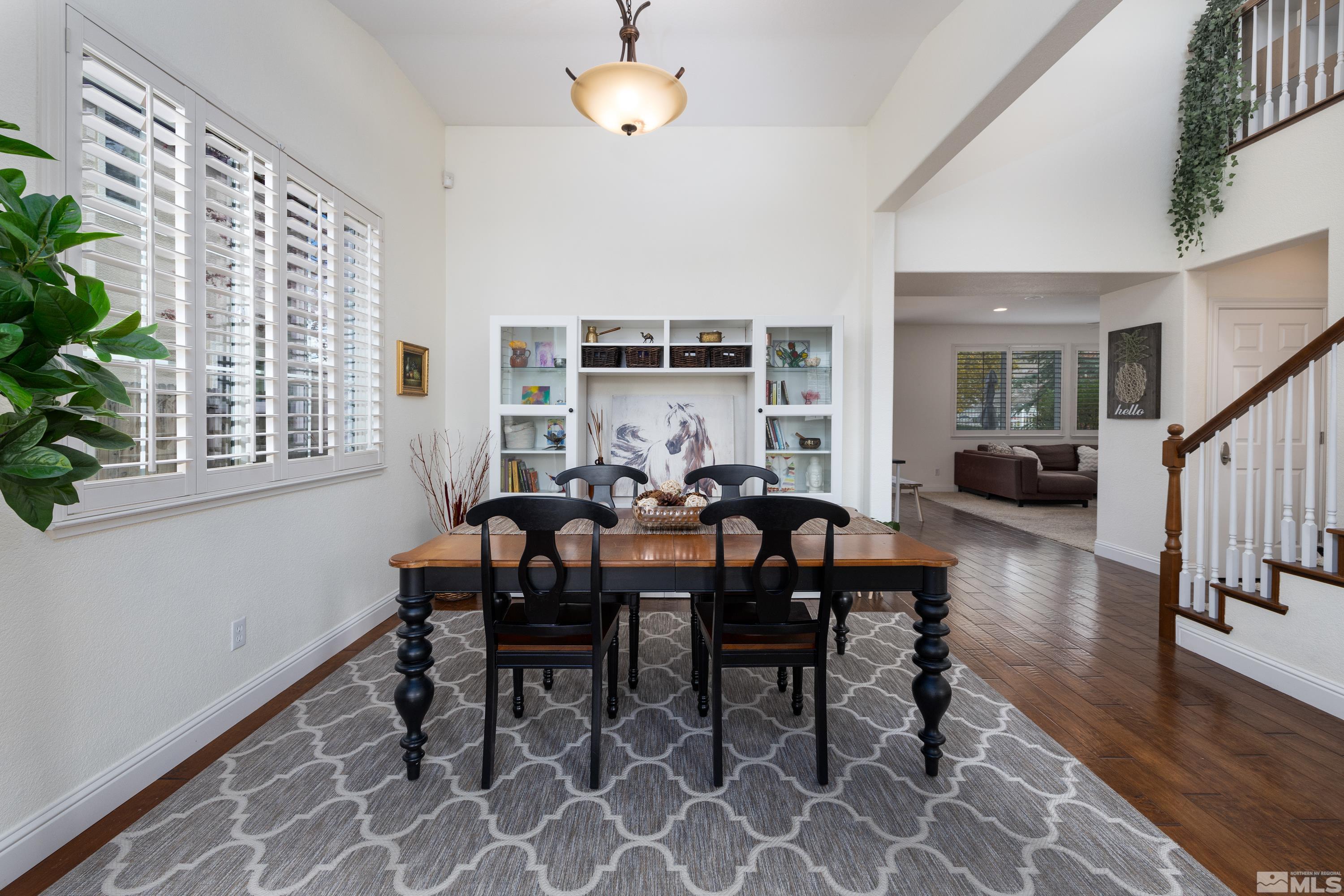 2585 Baton Drive Reno, NV 89521 - Photo 4 of 28 a view of a dining room with furniture window and wooden floor