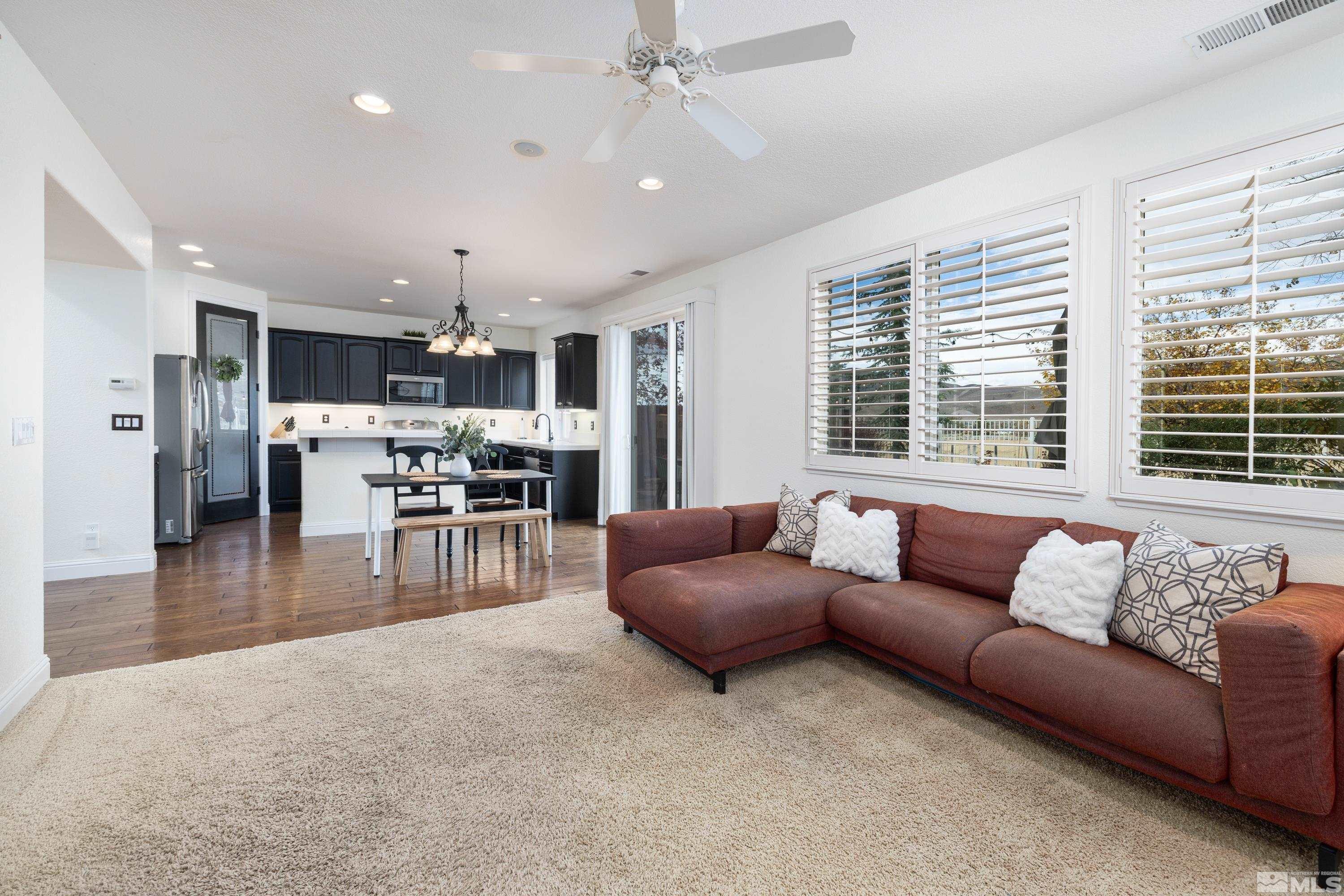 2585 Baton Drive Reno, NV 89521 - Photo 9 of 28 a living room with furniture and a large window