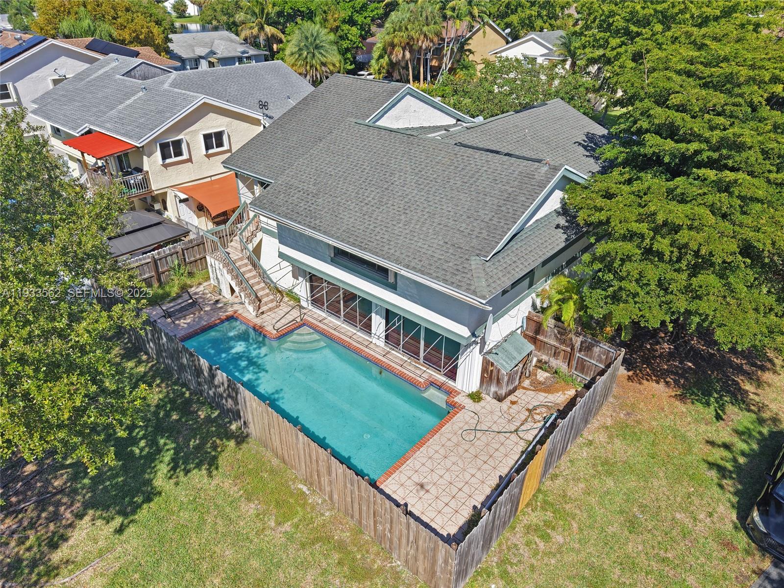 8531 Franjo Road Cutler Bay, FL 33189 - Photo 44 of 44 an aerial view of residential houses with yard