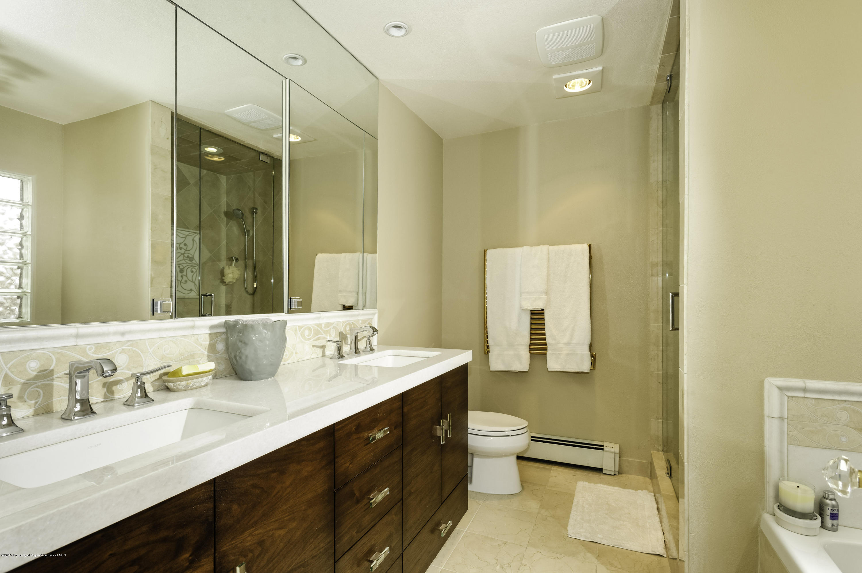 808 Kestrel Court Basalt, CO 81621 - Photo 13 of 22 a bathroom with a double vanity sink mirror and toilet