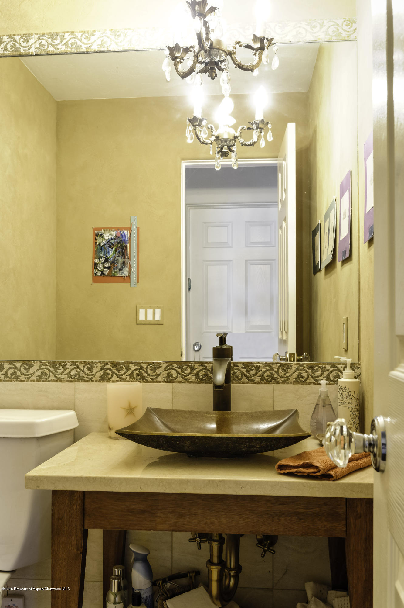 808 Kestrel Court Basalt, CO 81621 - Photo 20 of 22 a bathroom with a sink and a mirror