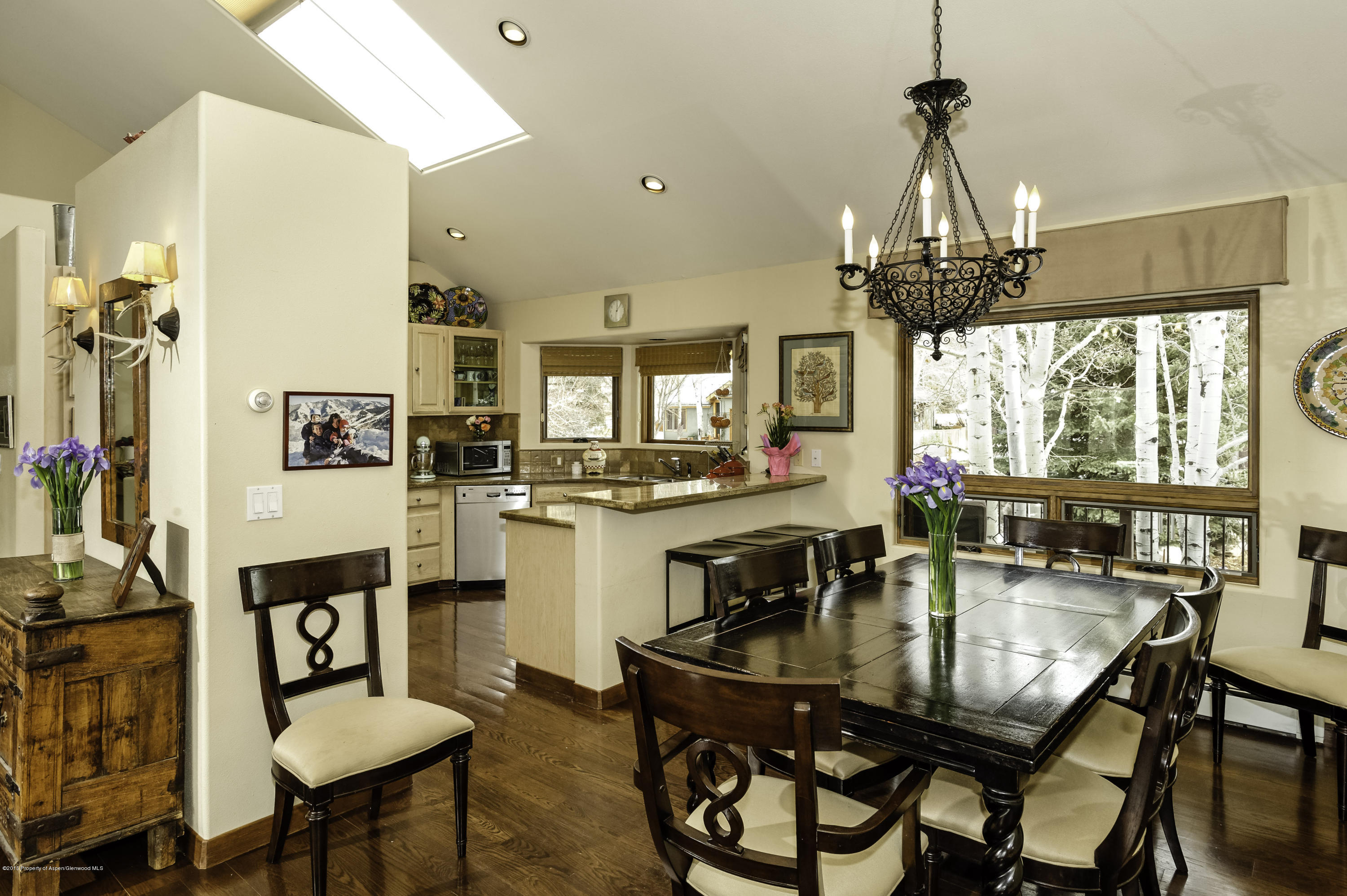 808 Kestrel Court Basalt, CO 81621 - Photo 7 of 22 a dining room with furniture and window