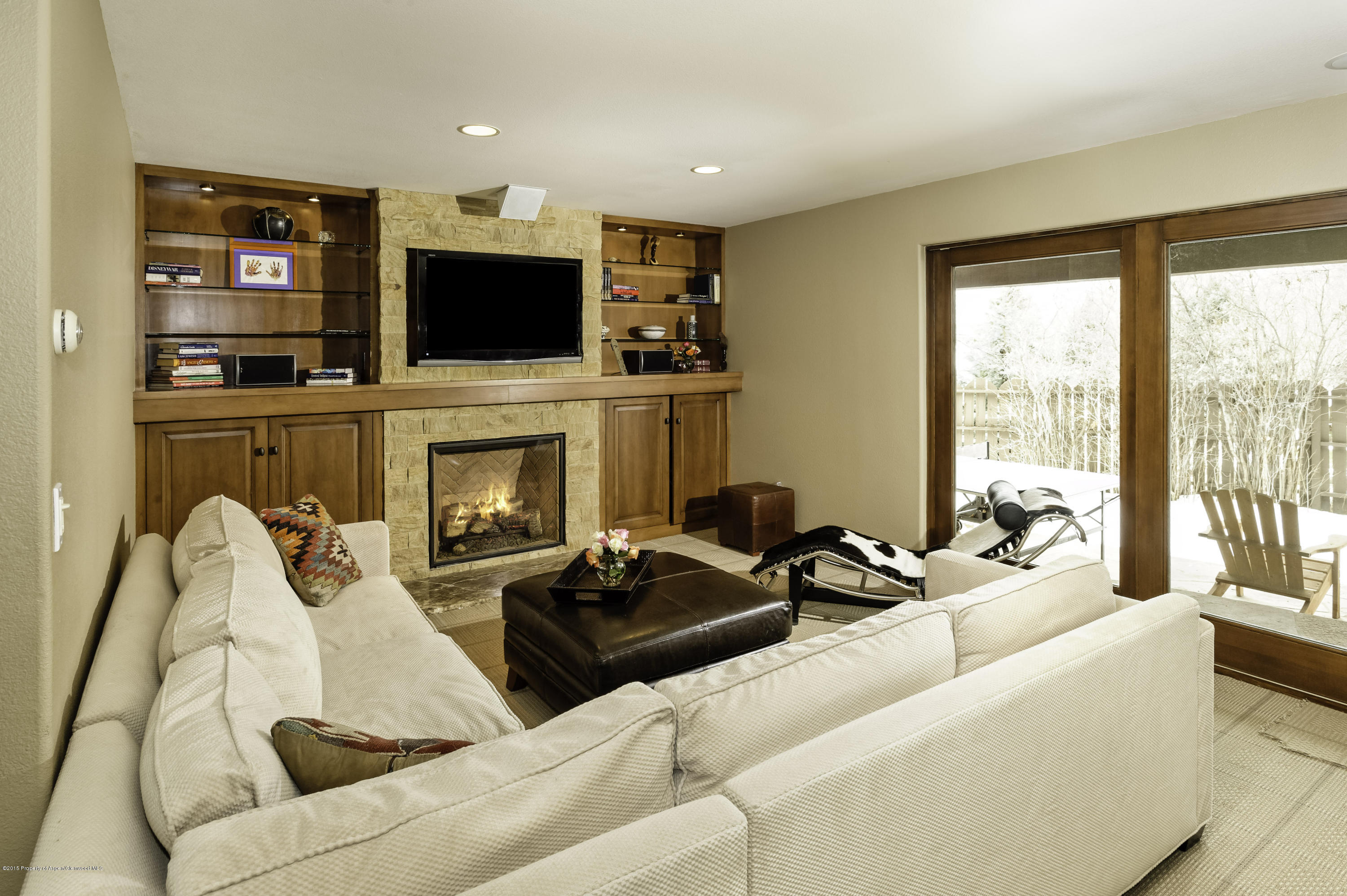 808 Kestrel Court Basalt, CO 81621 - Photo 8 of 22 a living room with furniture fireplace and flat screen tv