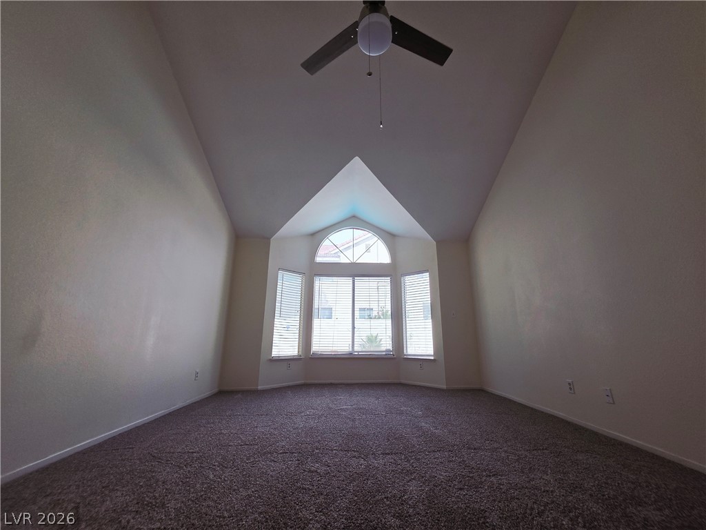 2920 Setting Sun Street Las Vegas, NV 89117 - Photo 23 of 43 This airy room features a high vaulted ceiling and bright bay windows.