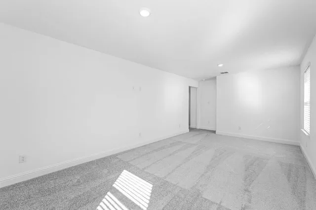 an empty room with an entryway