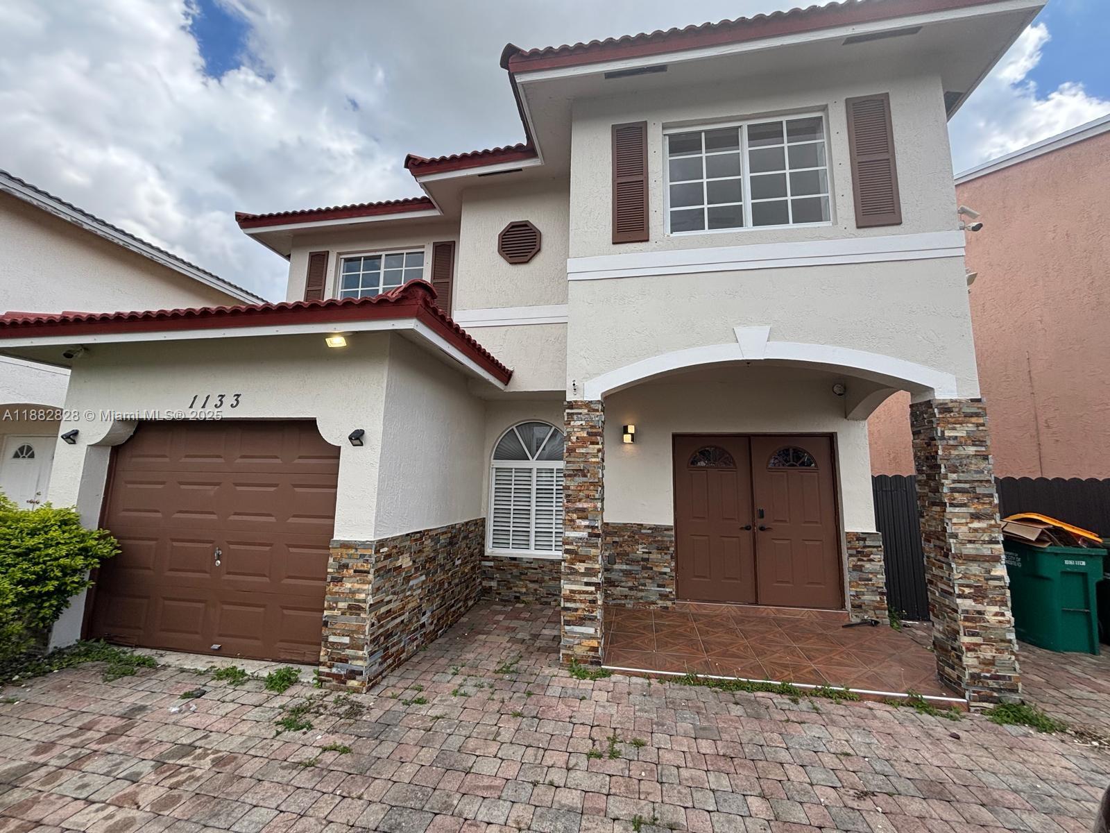 a house view with a outdoor space