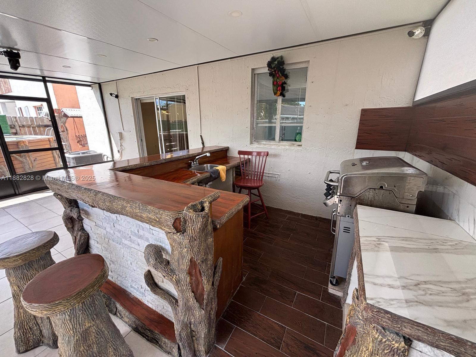 1133 Southeast 13th Terrace Homestead, FL 33035 - Photo 14 of 14 a living room with furniture and a window
