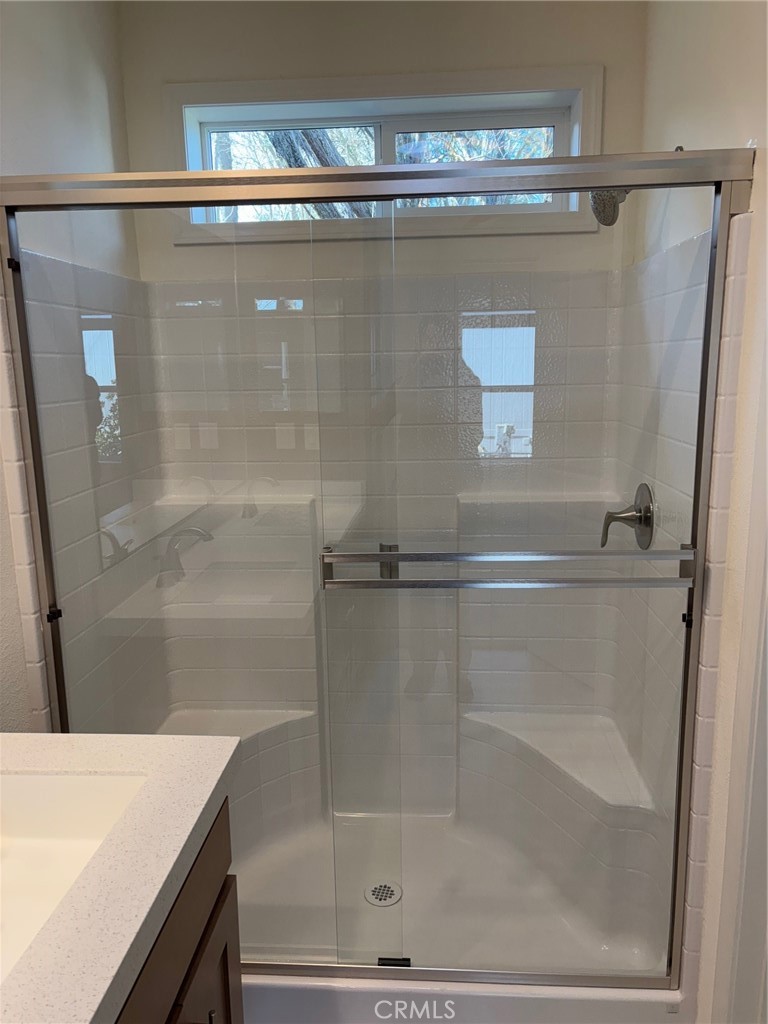 166 Via Robles, Unit 166 Paso Robles, CA 93446 - Photo 18 of 38 Primary walk-in shower