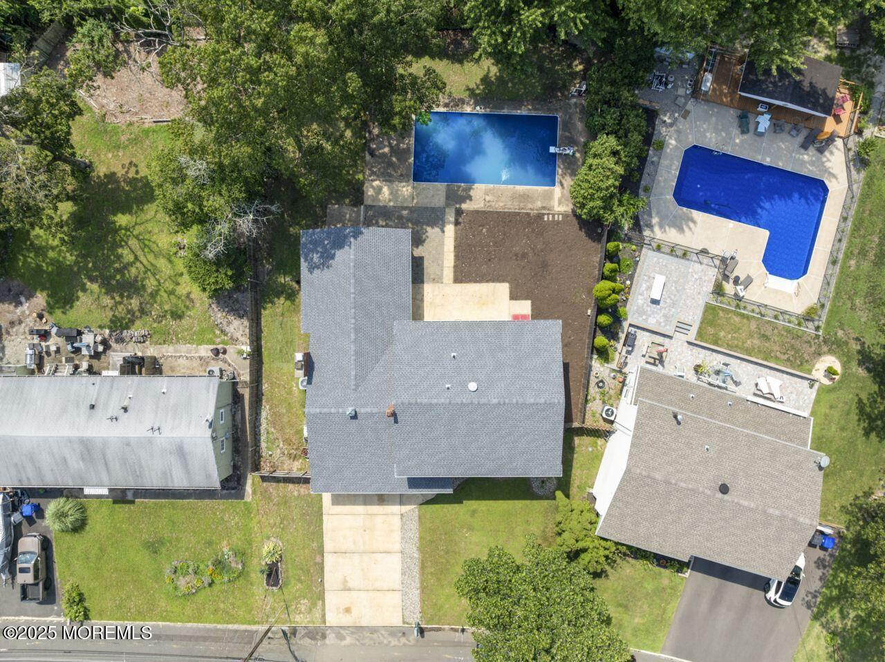 600 Driscol Drive Brick, NJ 08724 - Photo 31 of 35 an aerial view of residential houses with outdoor space and parking