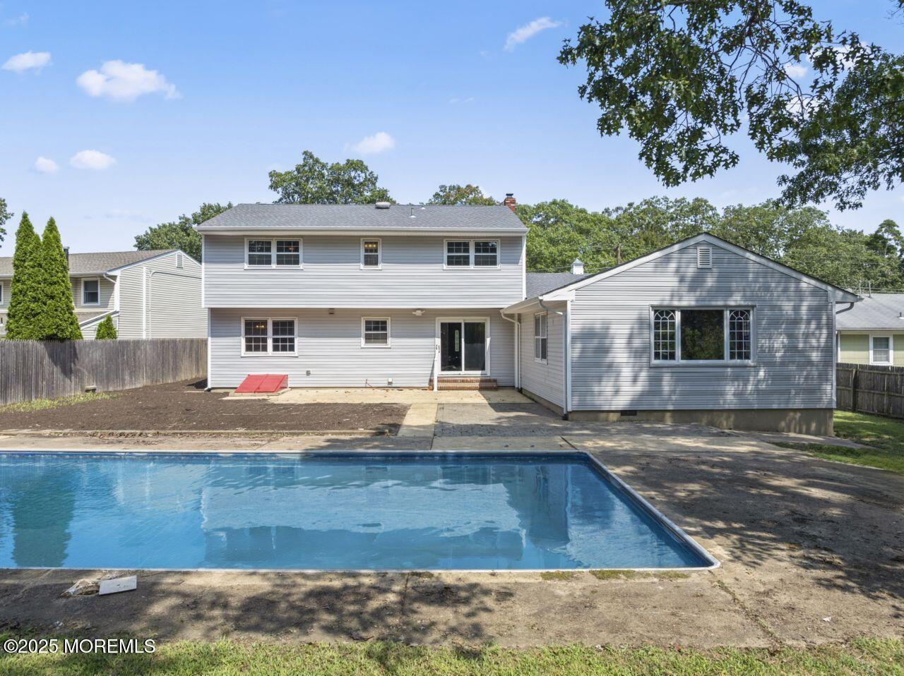 600 Driscol Drive Brick, NJ 08724 - Photo 4 of 35 a front view of house with yard
