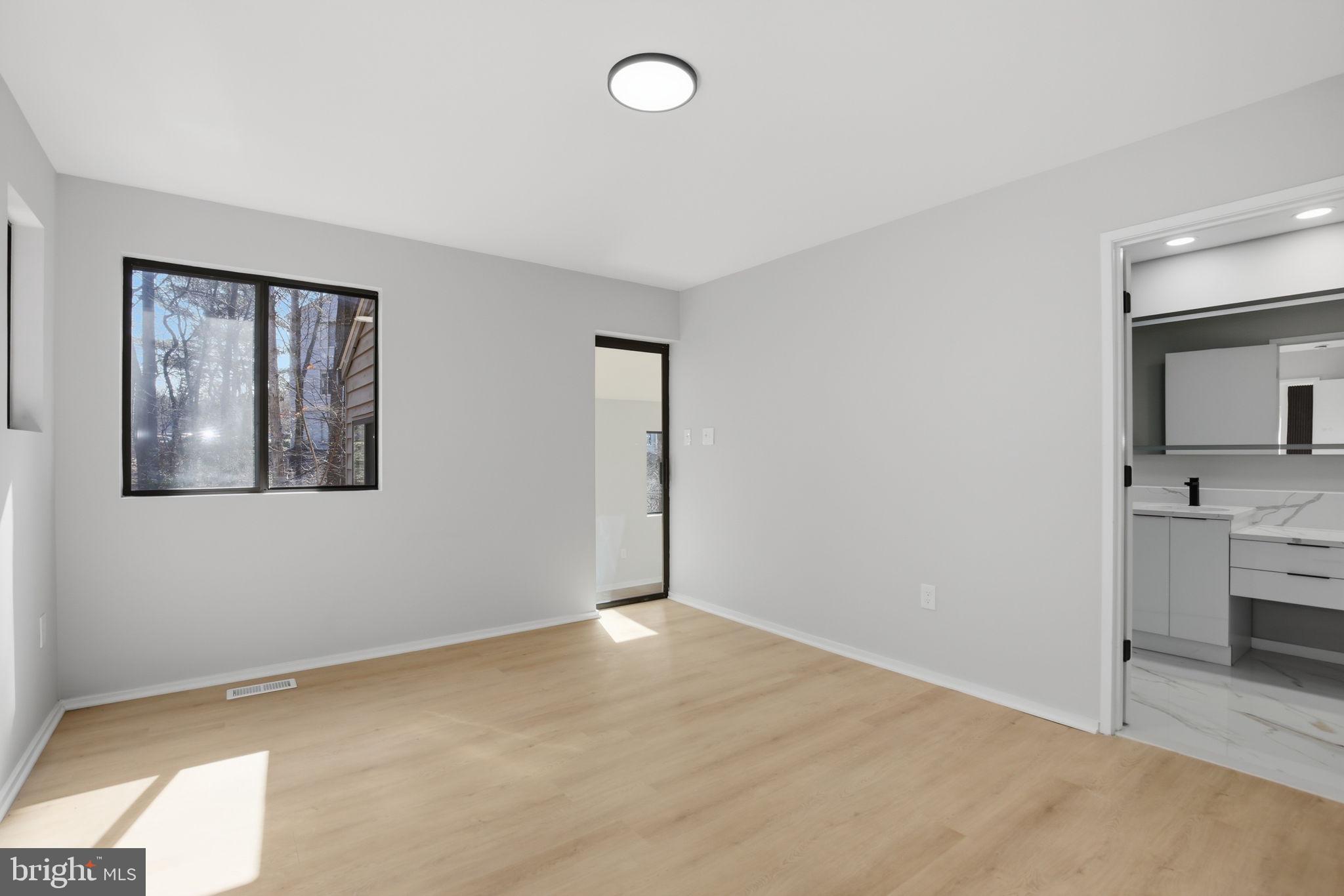 1671 Cedar Hollow Way Reston, VA 20194 - Photo 18 of 76 main level primary bedroom