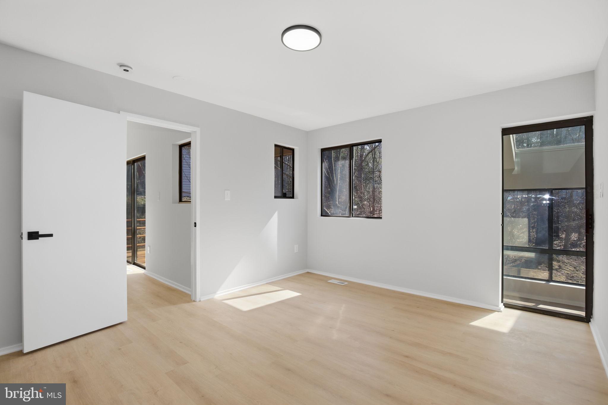 1671 Cedar Hollow Way Reston, VA 20194 - Photo 20 of 76 main level primary bedroom