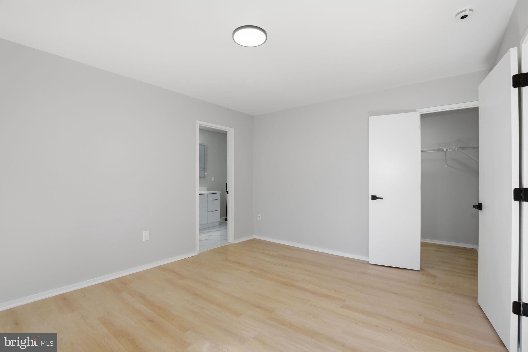 1671 Cedar Hollow Way Reston, VA 20194 - Photo 21 of 76 main level primary bedroom