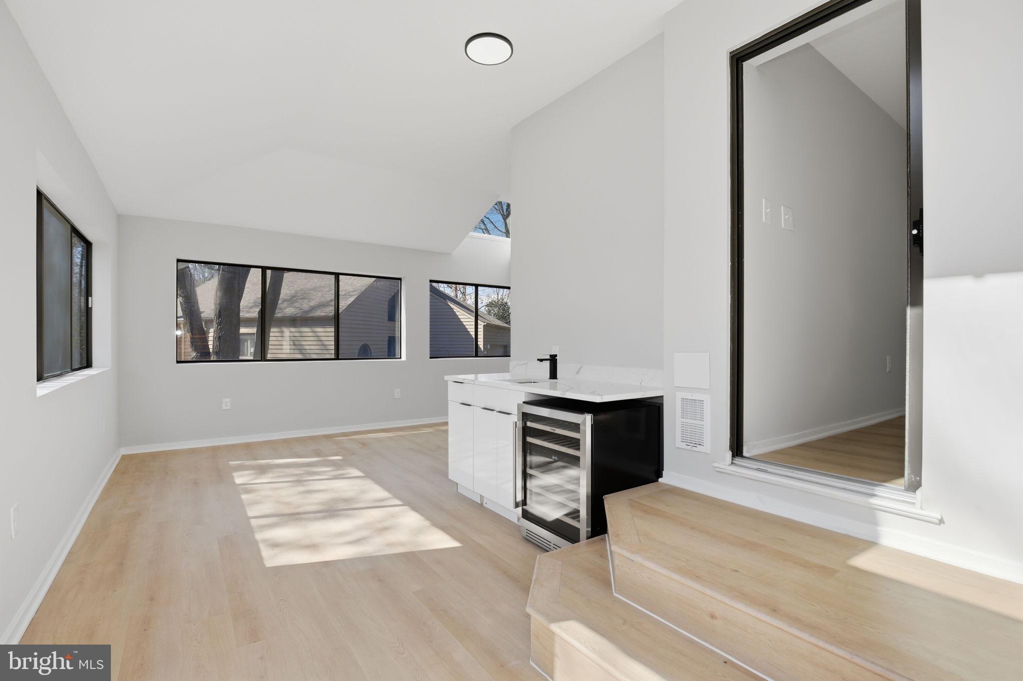 1671 Cedar Hollow Way Reston, VA 20194 - Photo 29 of 76 main level entertainment room