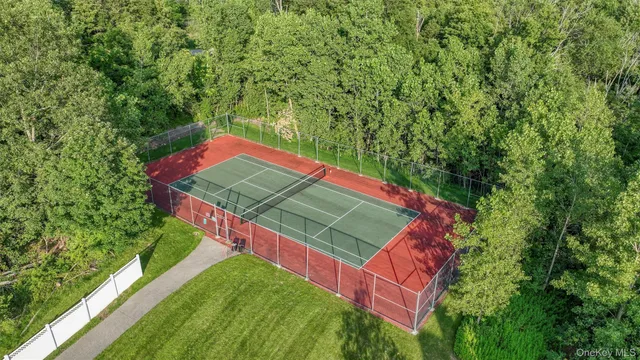 an aerial view of a tennis court