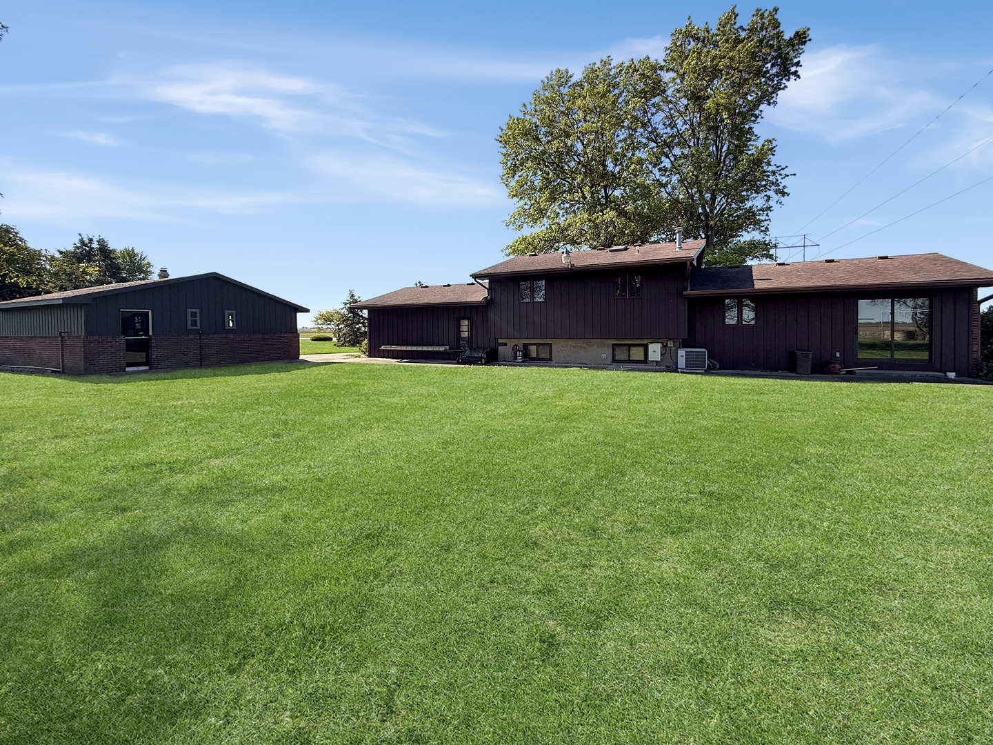 2052 County Road 3000 North Rantoul, IL 61866 - Photo 20 of 21 a view of a house with a yard
