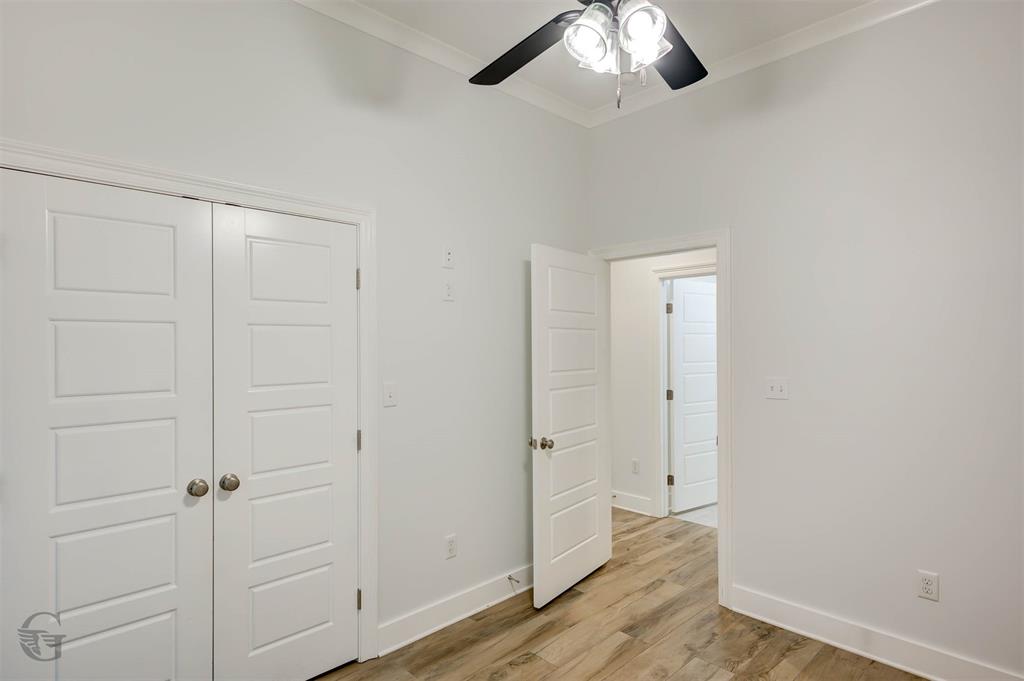 605 Meridian Way Benton, LA 71006 - Photo 18 of 29 Bright interior space featuring wood-finish flooring and a ceiling fan with integrated lighting