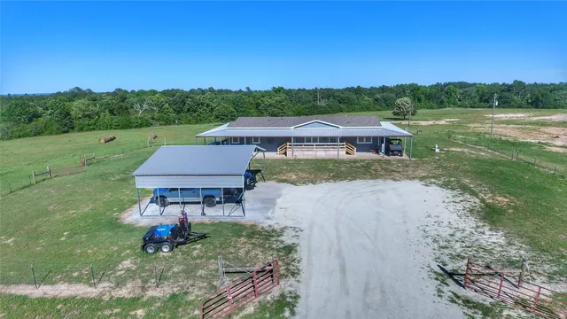 a view of a house with a yard and a yard