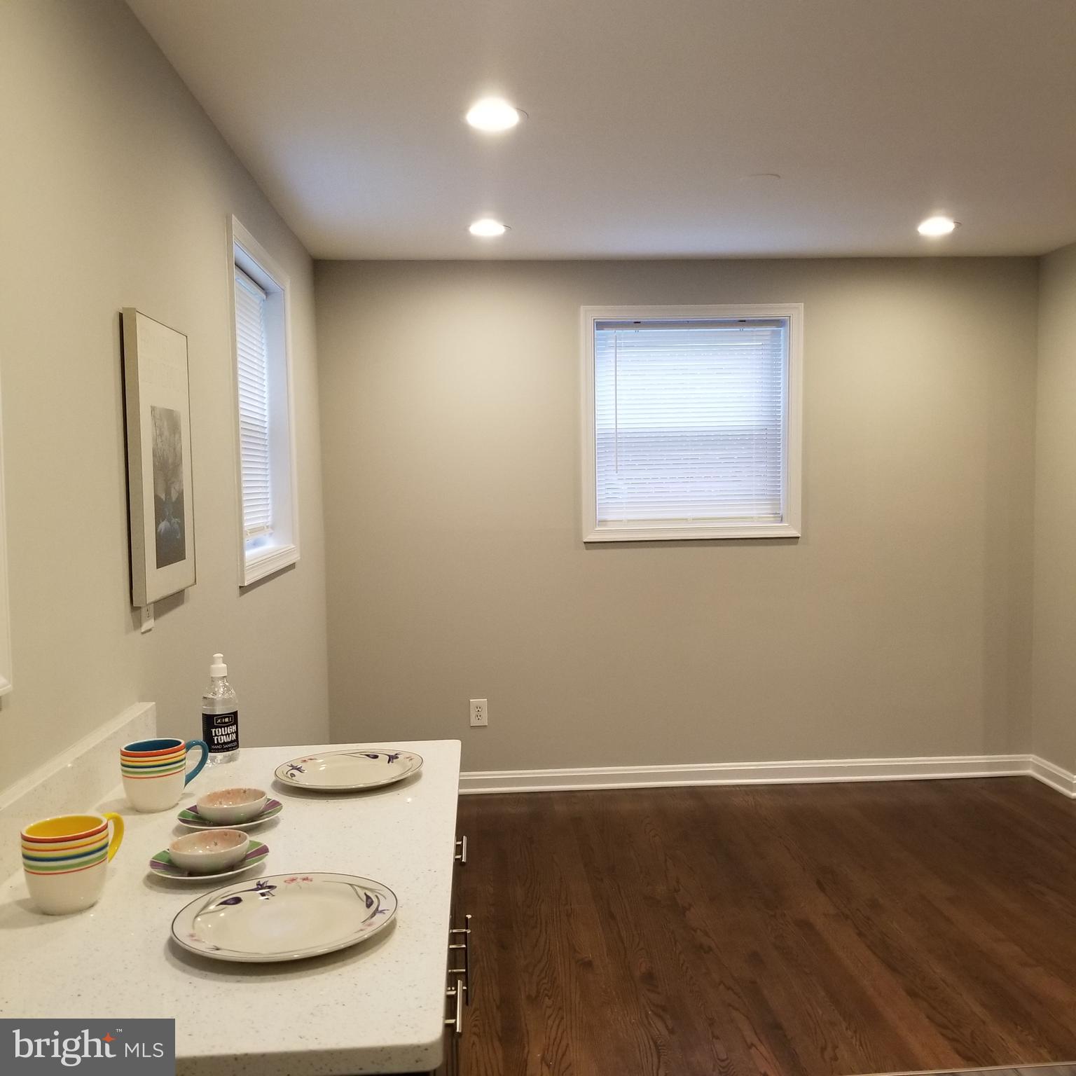 4704 Red Fox Road Rockville, MD 20852 - Photo 6 of 19 a view of a dining room with furniture and wooden floor