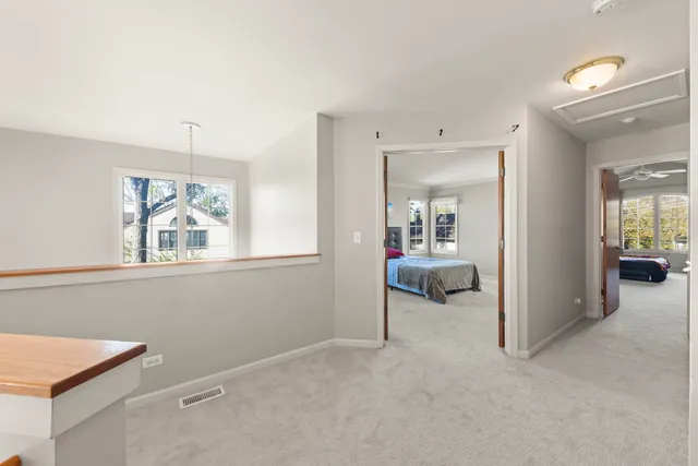 a view of a livingroom with furniture and windows