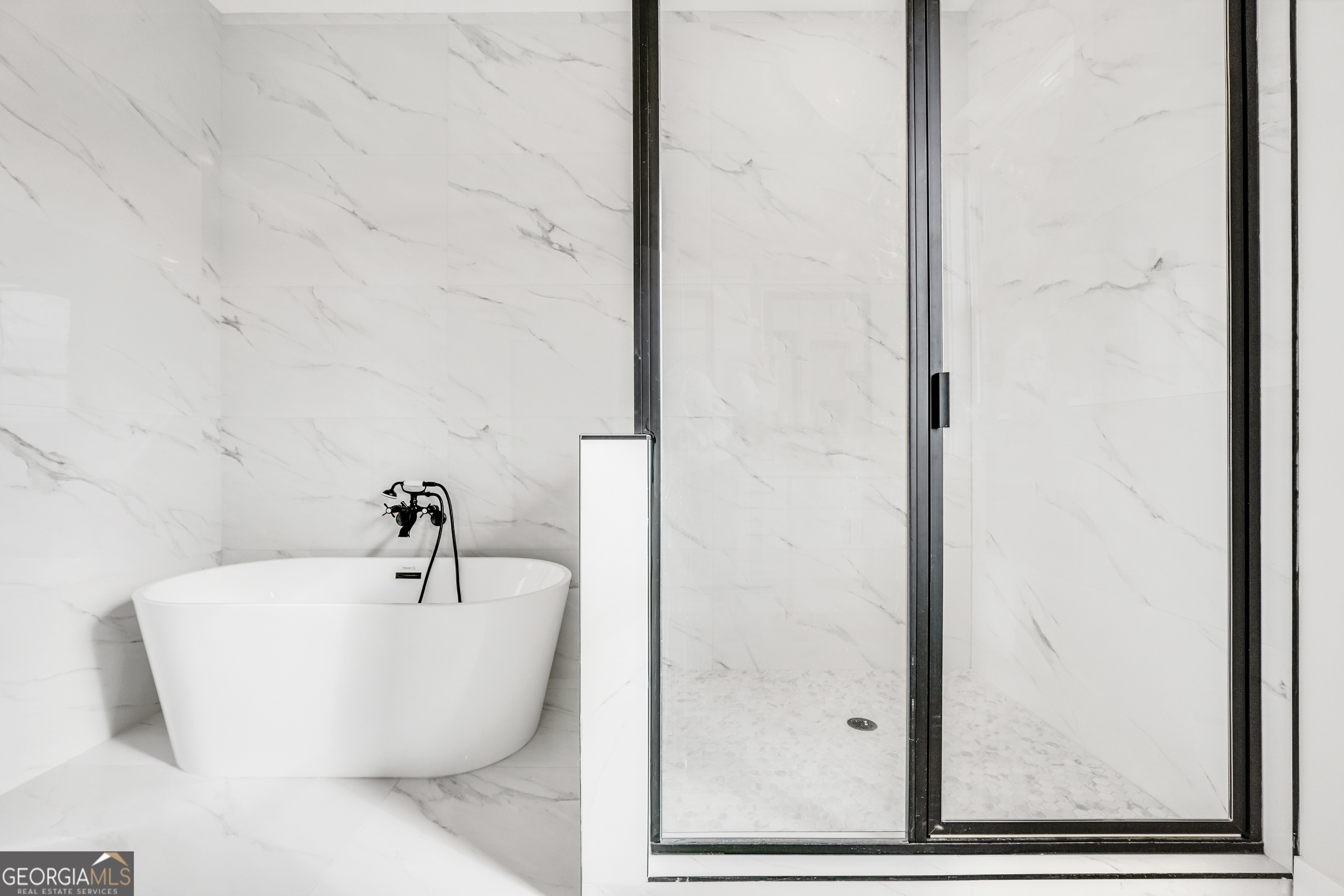 297 East Knight Road McDonough, GA 30252 - Photo 33 of 64 a white bath tub sitting next to a white sink