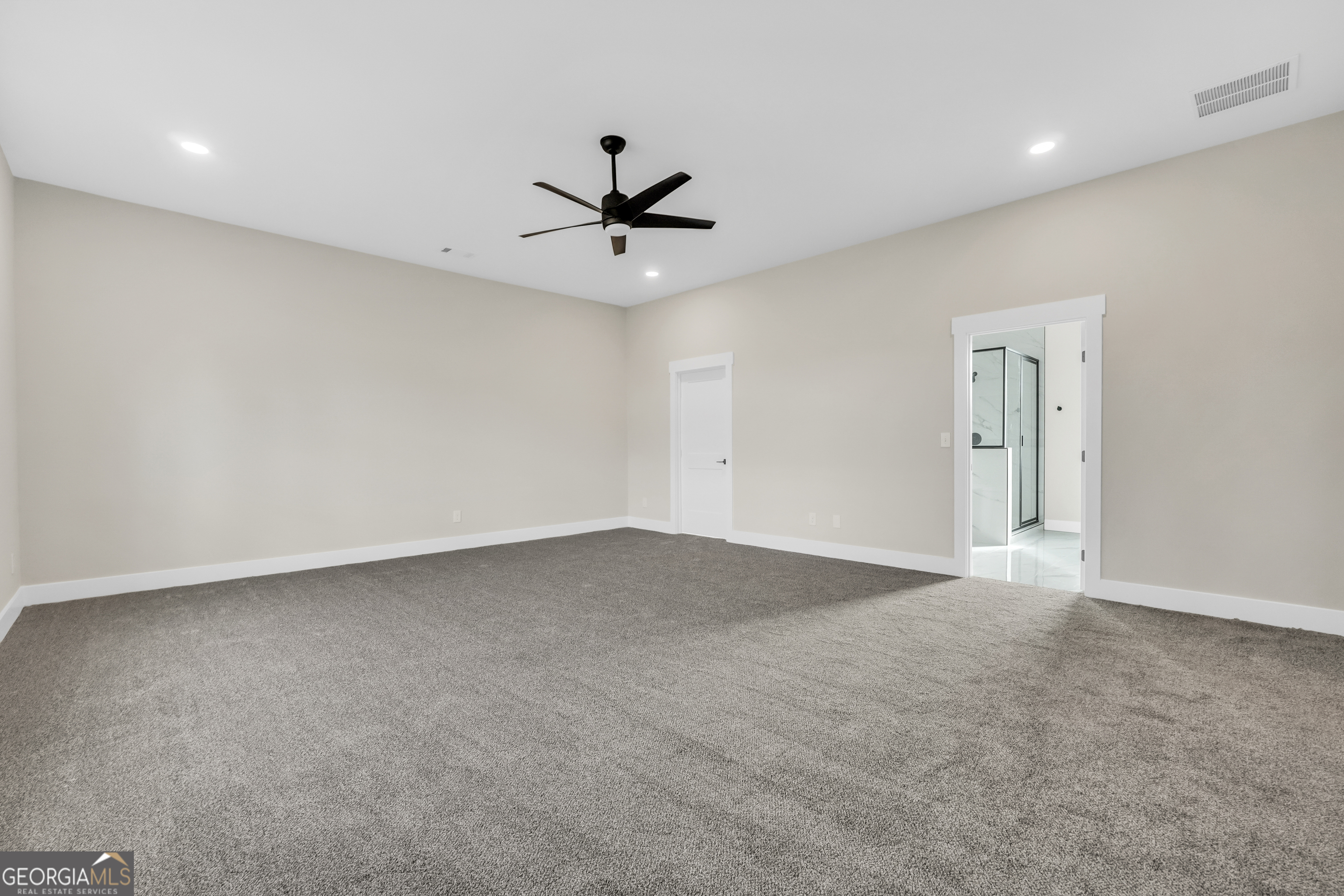297 East Knight Road McDonough, GA 30252 - Photo 40 of 64 a view of an empty room with a ceiling fan