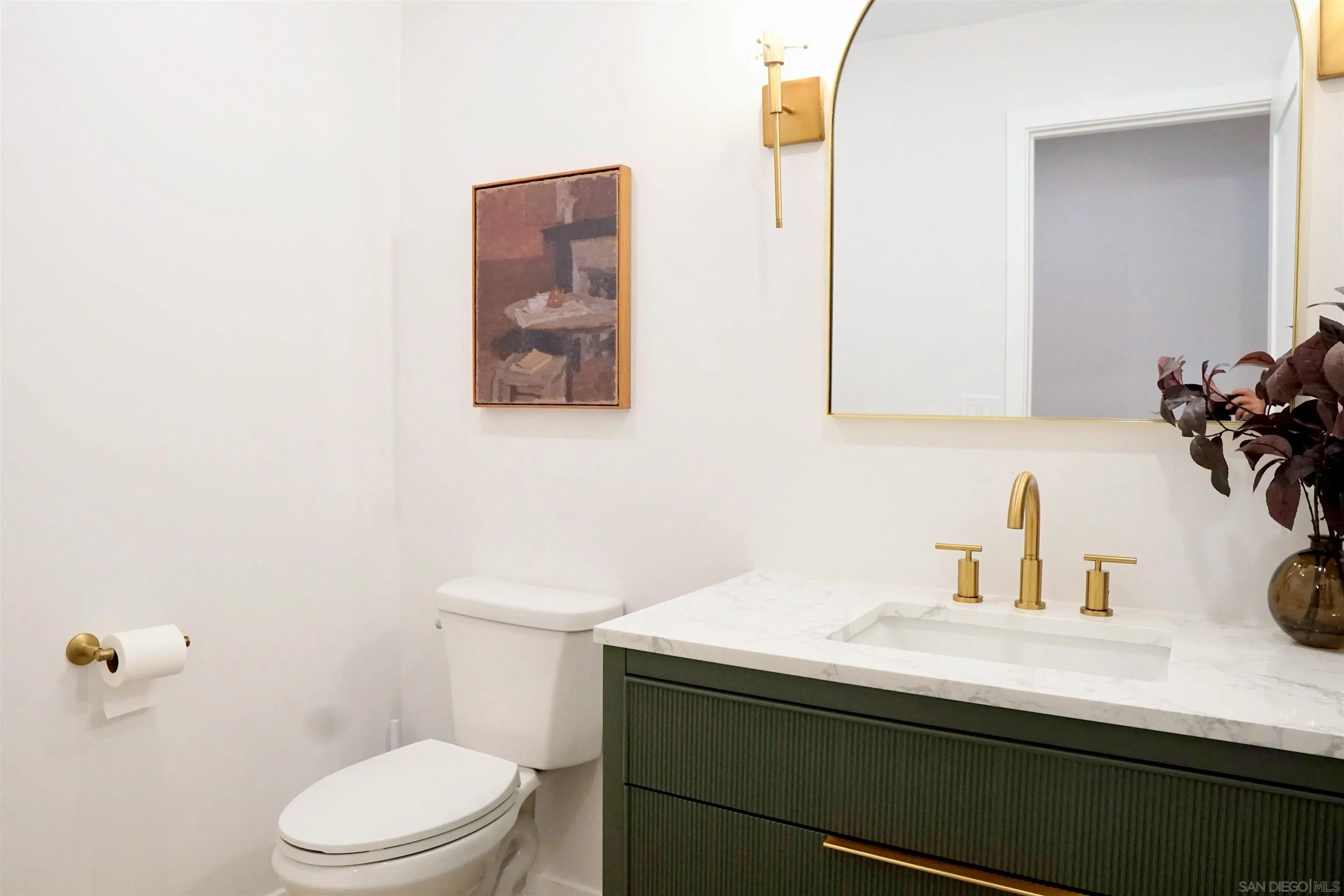 4242 Avenida Gregory Spring Valley, CA 91977 - Photo 21 of 53 a bathroom with a sink and a toilet
