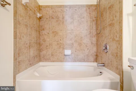 a bathroom with a bathtub