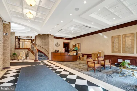 a room with lots of table chair