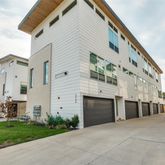 a view of a building with a yard